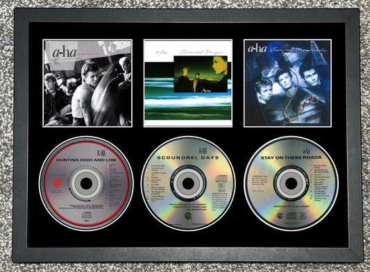 A-Ha | Hunting High & Low | Scoundrel Days | Stay On These Roads | Retro Triple CD Wall Display | Frame Not Included |