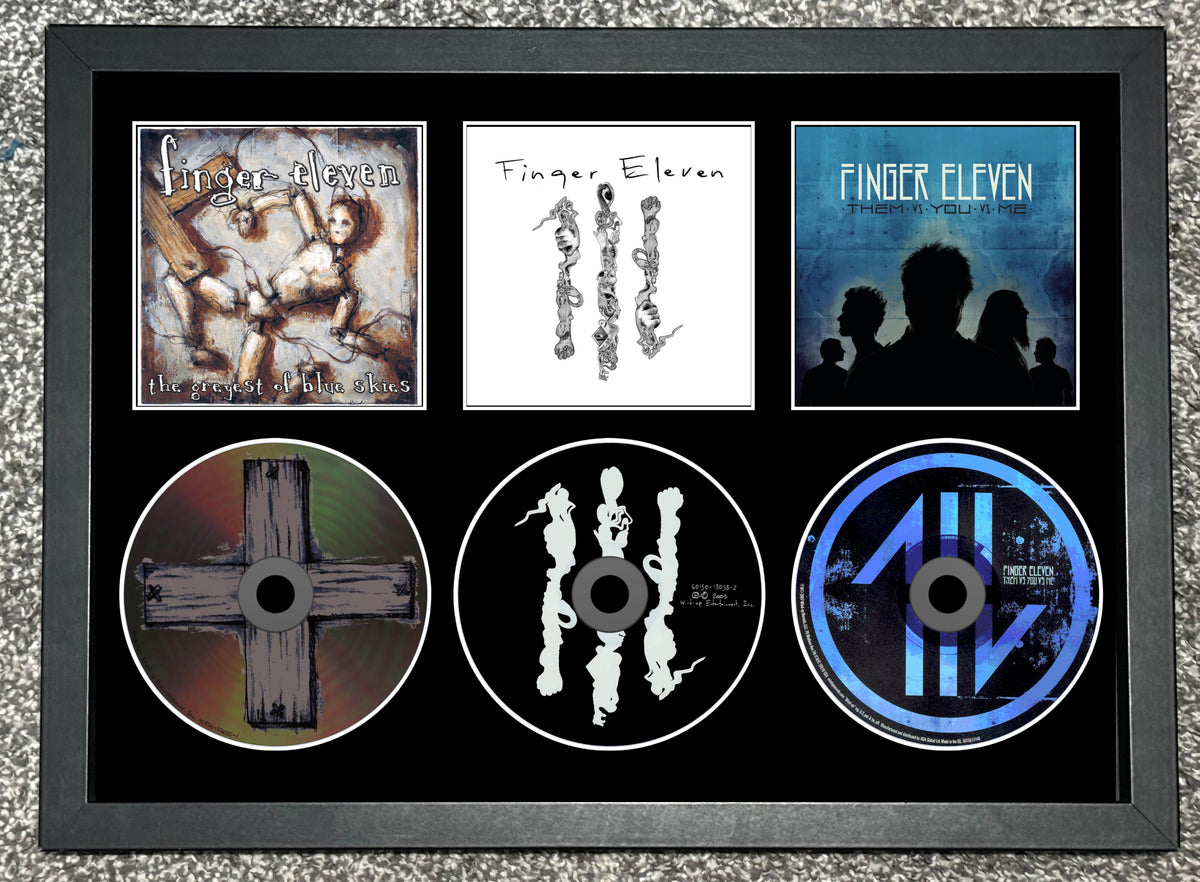 Finger Eleven | The Greyest of Blue Skies | Finger Eleven | Them Vs You Vs Me | Triple Retro Mounted CD Wall Display | Frame Not Included |
