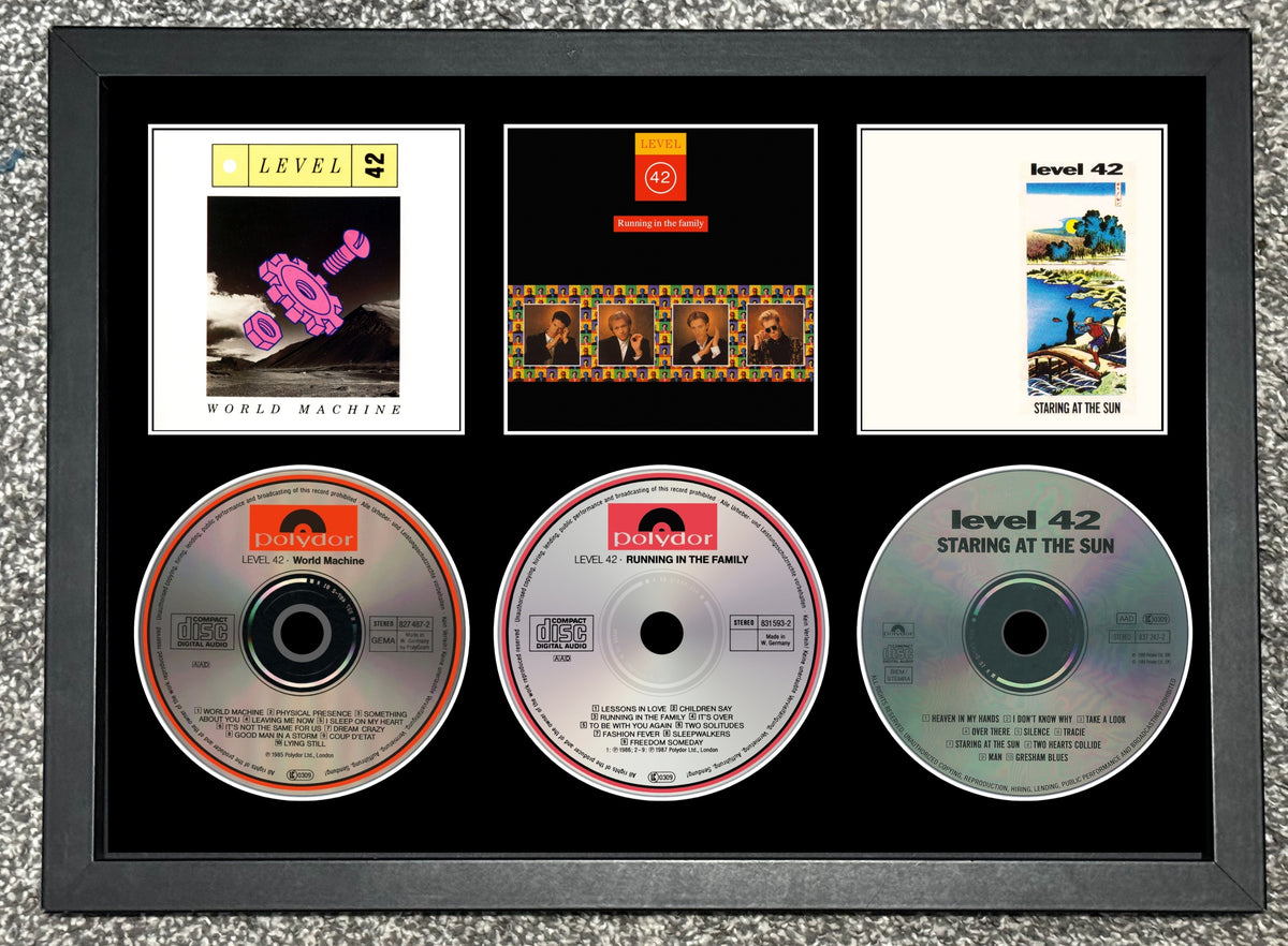Level 42 | World Machine | Running In The Family | Staring At The Sun | Retro Triple CD Wall Display | Frame Not Included |